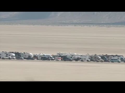 Burning Man attendees trying to leave after rain trapped them for days