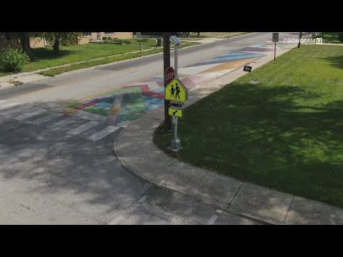Indy street painting, designed to stop speeding, is expanding this weekend