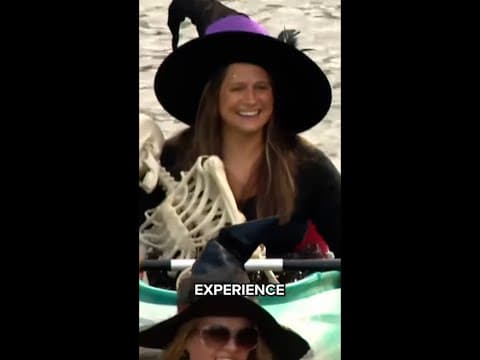 100 witches kayak down Indianapolis Canal for the Children's Museum haunted house opening week