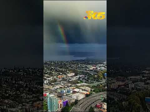 Need a moment of calm? Watch as rainbows and rain showers pass through Seattle 🌈