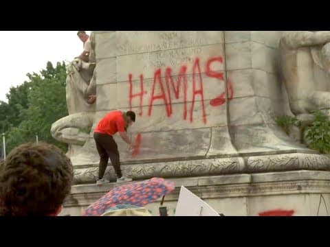 Protester sprays 'Hamas is comin' on Christopher Columbus statue in Washington, D.C.