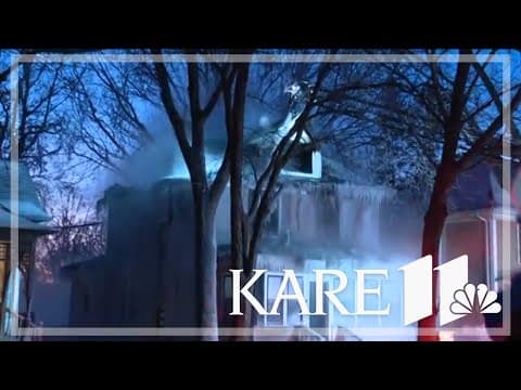 Minneapolis fire crews battle house fire amid freezing conditions