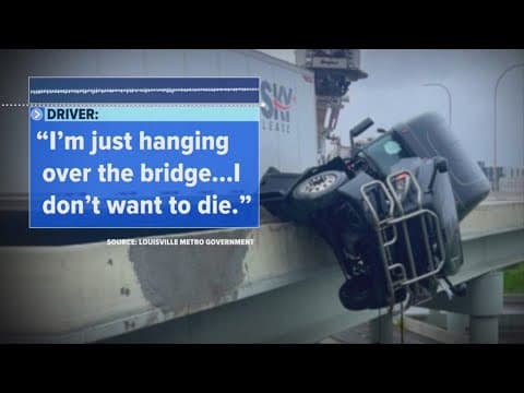 Semi-truck sent dangling over bridge after crash in Kentucky