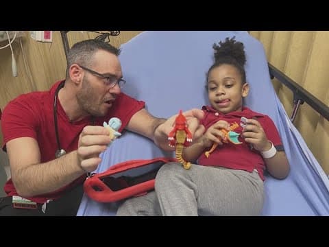 Pediatric nurse comforts his patients through the power of play