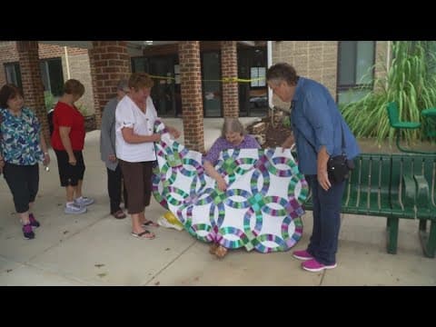 A group of quilters give the ultimate gift to a woman in need