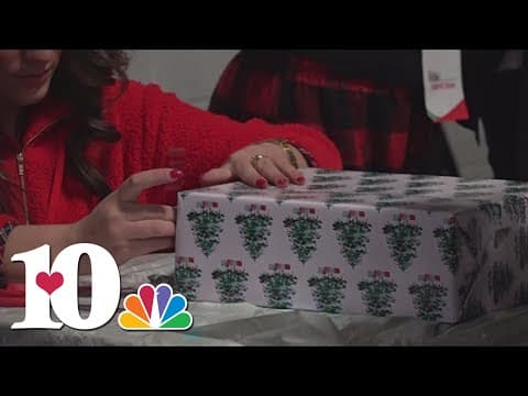 Parents shop for gifts at City Hills Christmas Mall