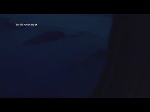 Video shows flames shooting from engine of a United Airlines flight