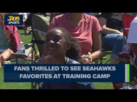 Fans celebrate the upcoming football season at Seahawks Training Camp