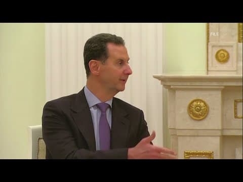 Rebel fighters oust Assad family from Syrian government