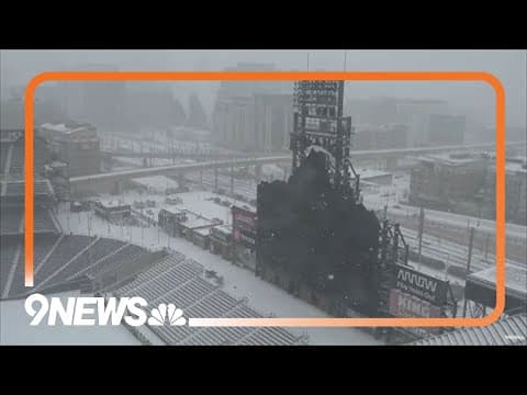 Snow falls in Denver area with below-zero temperatures