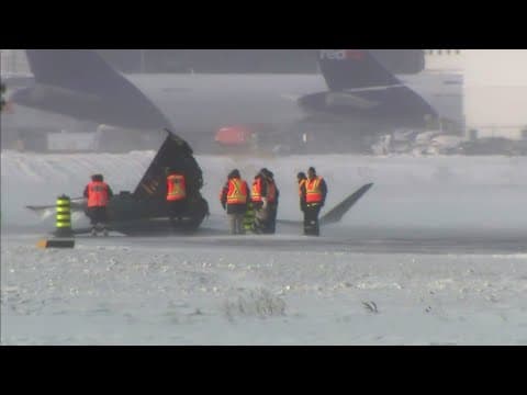 Teams of investigators trying to determine what caused Toronto plane crash