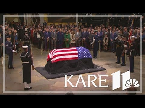 Jimmy Carter's casket arrives at the US Capitol, where he will lie in state