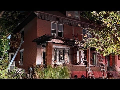 Woman hospitalized after porch fire at Hilltop home