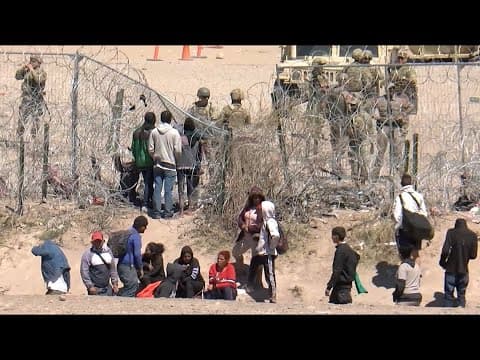 Hundreds of migrants arrested by Border Patrol after they rushed past razor wire