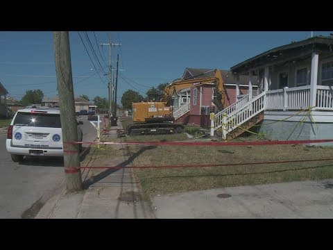 City delays plan to demolish home where three children died in fire