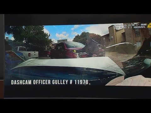Video from a police shooting at a North Dallas apartment complex shows truck ramming into police car