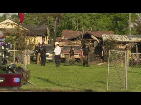 Crews work to battle fire at Baytown home