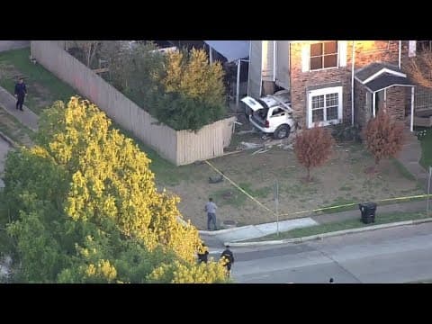 Car crashes into home in SW Houston