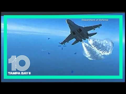 U.S. video shows Russian jet dumping fuel on its drone
