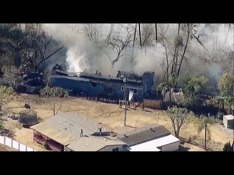 Large plumes of smoke seen from brush fire in Fallbrook in North San Diego County