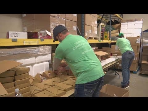 Volunteers pack 'Blizzard Boxes' for Columbus seniors before winter
