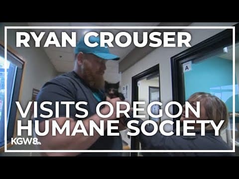 Olympian Ryan Crouser visits dogs and cats in need of homes at Oregon Humane Society