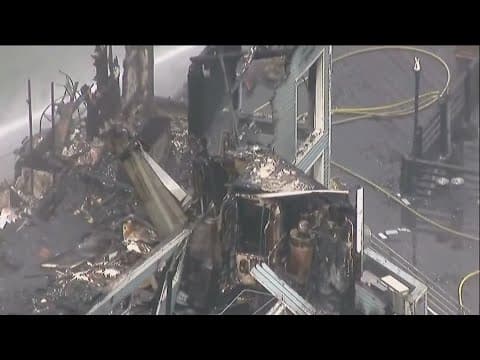 Oceanside Pier still smouldering one day after massive fire