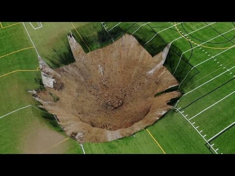 Massive sinkhole swallows up Illinois soccer field
