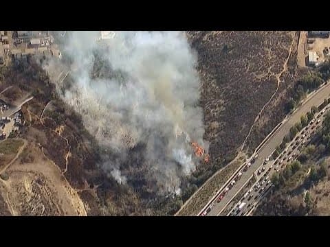 Fire crews battle brush fire in Poway