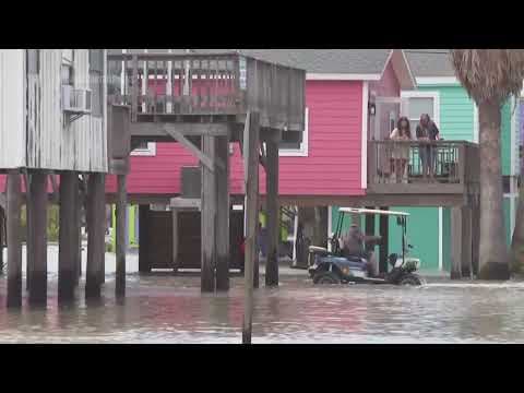 Flooding left behind from Tropical Storm Alberto in Surfside Beach, Texas