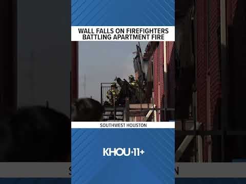 Wall falls on Houston firefighters battling a three-alarm apartment fire