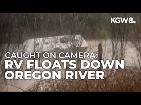 RV floats down Sixes River in Southern Oregon