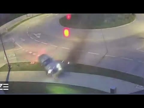 Video shows car fly over traffic circle in crash in Dallas