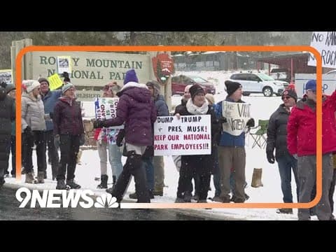 Dozens of people protest job cuts outside of Colorado national park