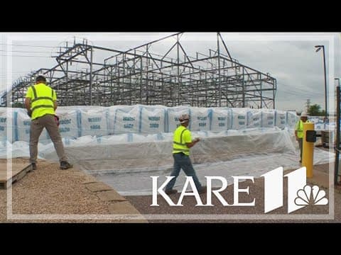Xcel Energy crews place sandbags around plant as Minnesota River levels rise