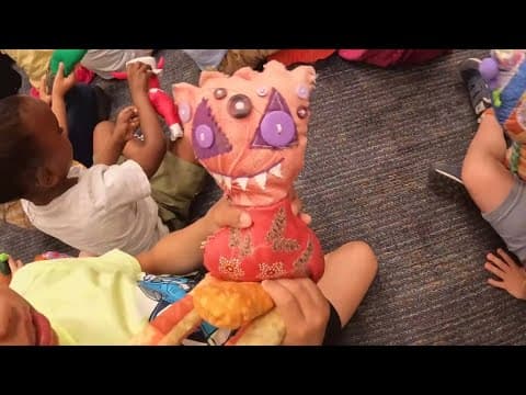 High school students help kindergarteners' artwork come to life