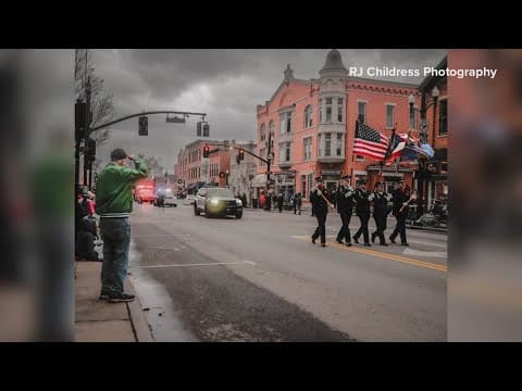 Search continues to find man captured in photo saluting the American flag during parade