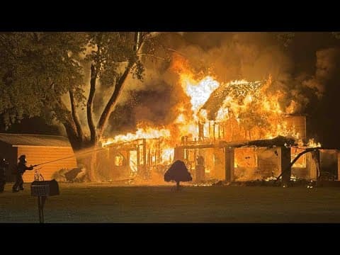 Massive fire destroys Tipton County home while homeowners were out of town