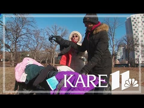 Volunteers distribute thousands of winter clothing items across parks during annual 'scarf bomb'