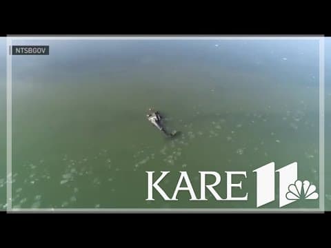 Police and fire divers preparing to lift Black Hawk out of Potomac