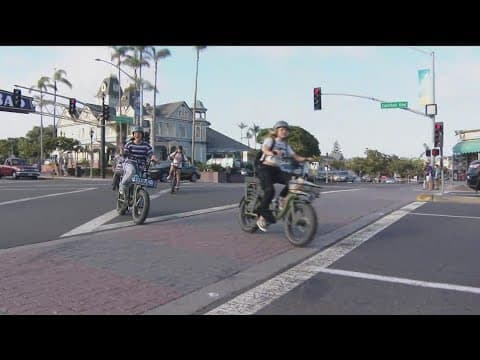 City staff and police officers promote bike safety in Carlsbad
