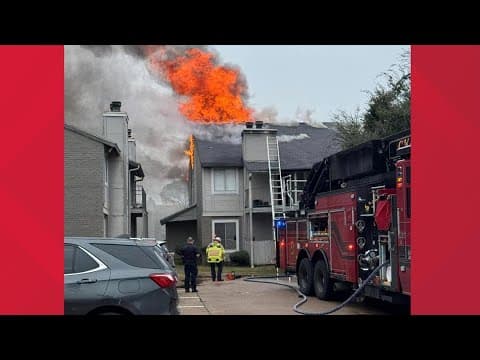 Woman escapes apartment fire by jumping off balcony