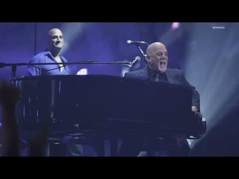 Billy Joel and Sting performing at Lucas Oil Stadium in downtown Indy