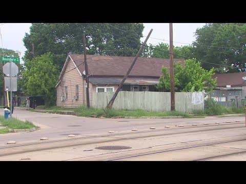 Near Northside neighbors concerned as splintered utility pole left leaning on cables