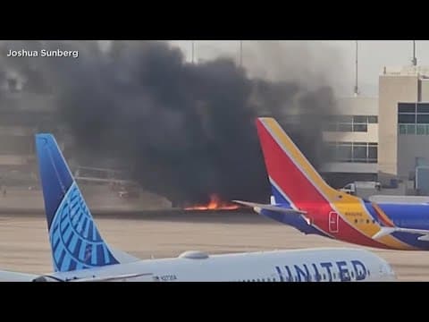 Denver plane fire: Passengers react after getting off burning plane