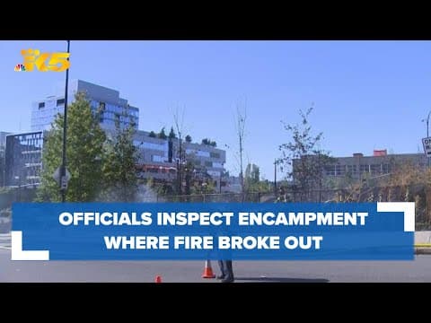 Officials inspect encampment where fire broke out in downtown Seattle