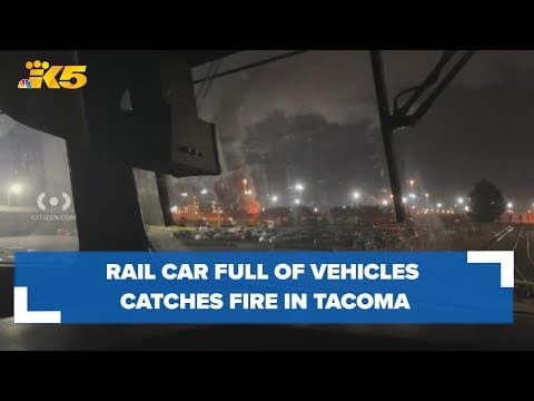 Rail car full of vehicles catches fire in Tacoma