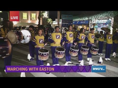 Marching With The Band | WWL’s Whitney & Malik join Warren Easton for the Krewe of Alla parade!