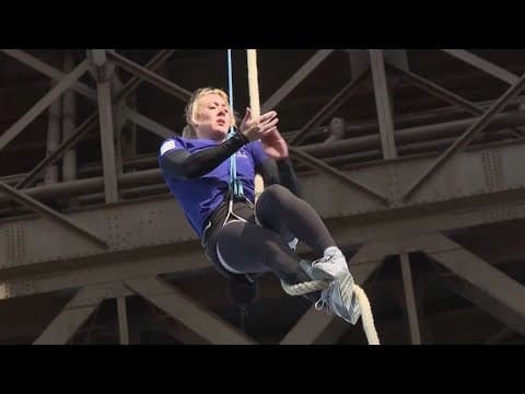 Woman sets free-standing rope climb record at Eiffel Tower
