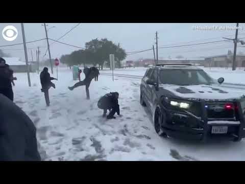 Firefighters, police officers have snowball fight during rare winter storm in Texas